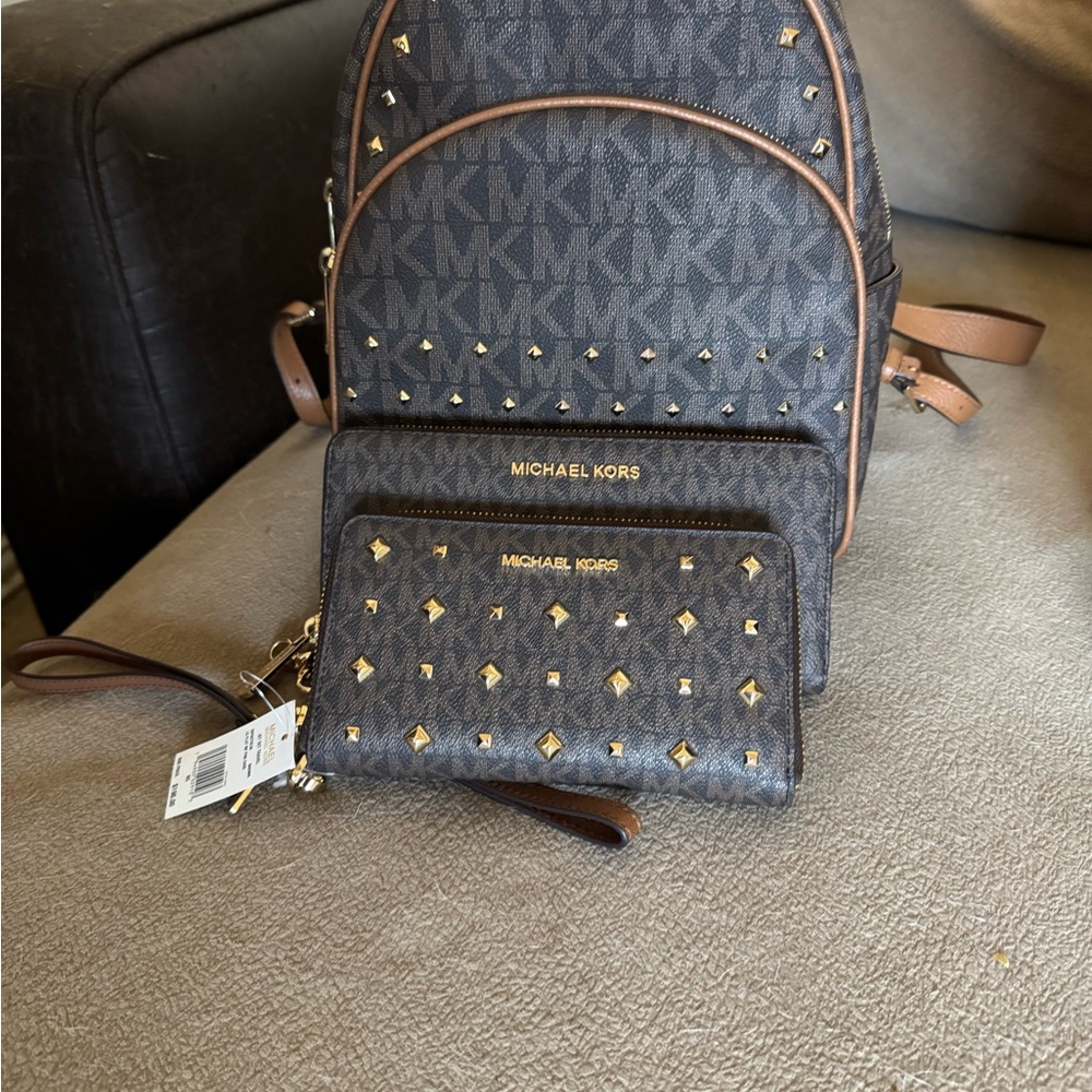 Michael Kors Black and Brown Backpack with Monogram Pattern